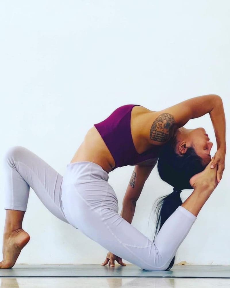 Nicha in a kneeling backbend